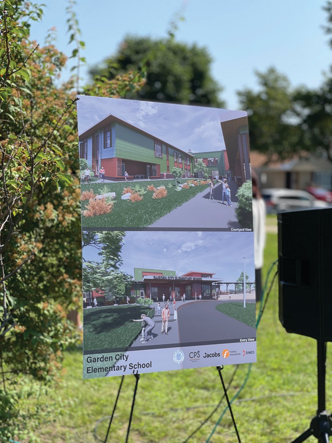 WHAT’S IN STORE: Renderings of how the new Garden City School will look inside and out greeted visitors during last week’s ceremony.